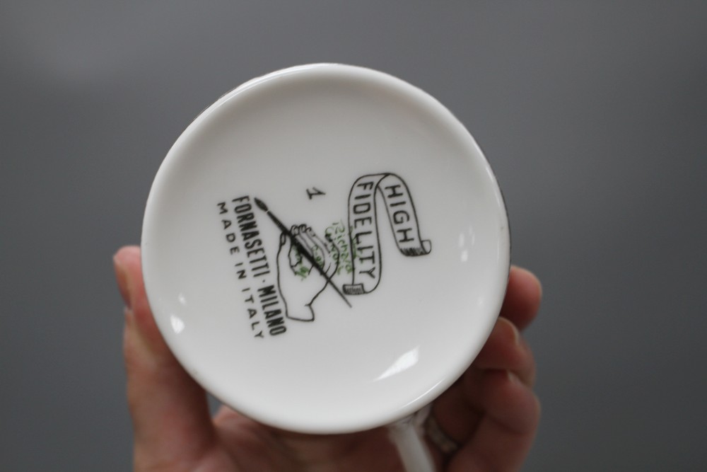 A Fornasetti Ginori High Fidelity cup and saucer, decorated with cats, saucer 13.5cm, cup height 5,75cm